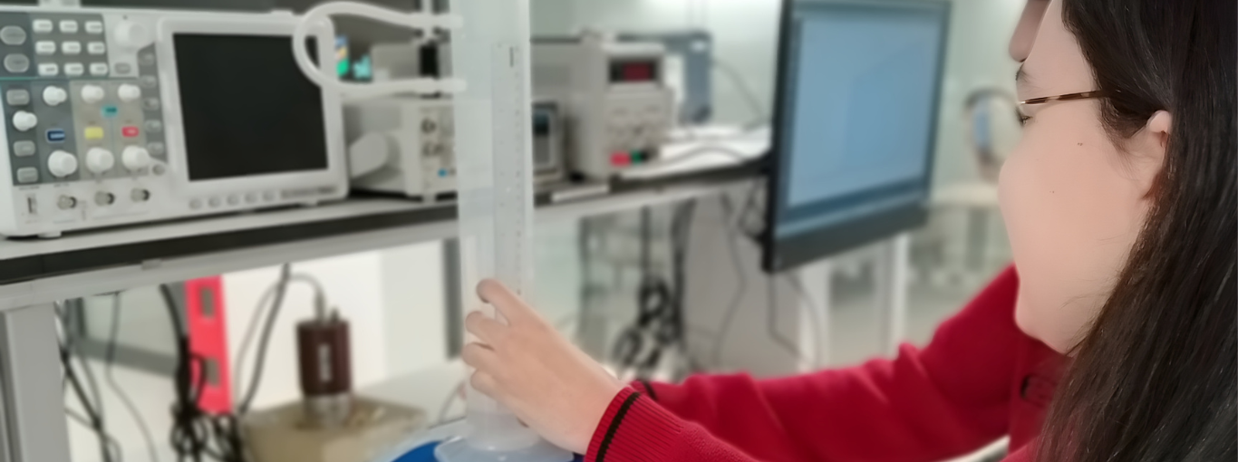 Sixth form students using lab equipment